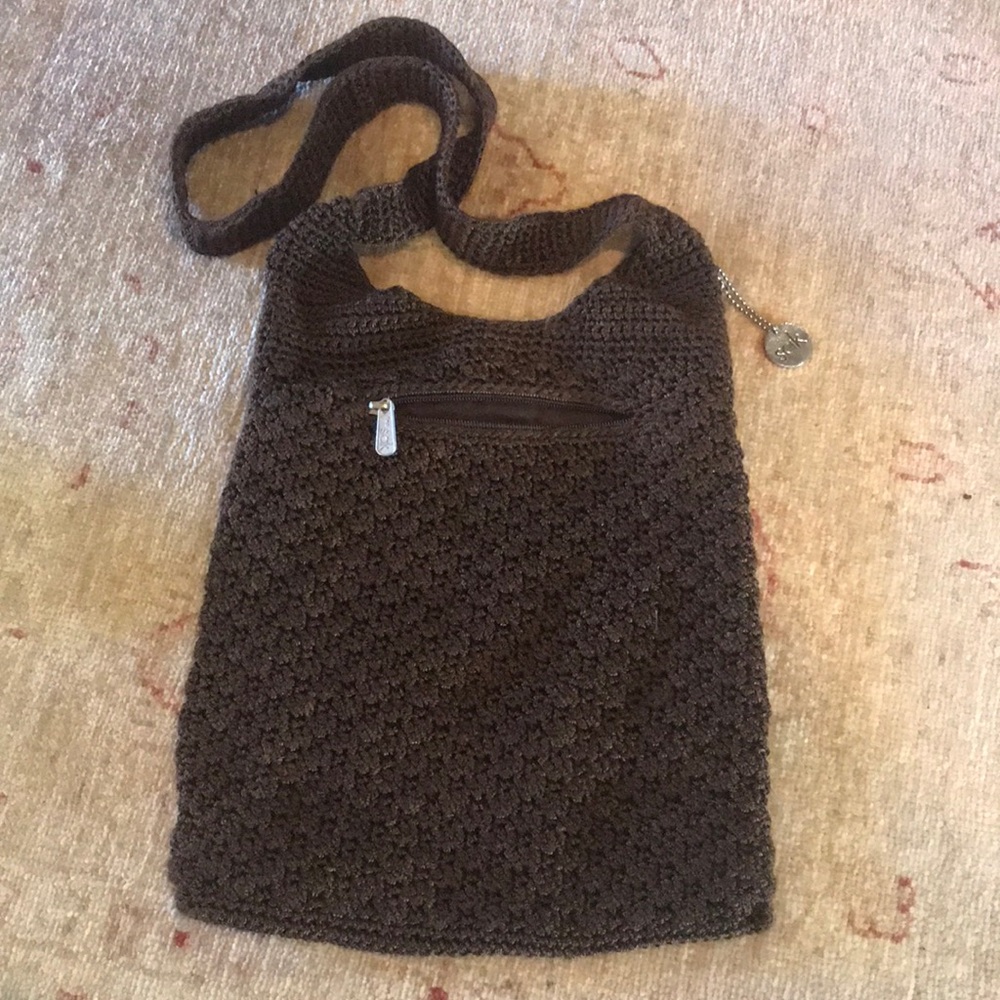 The Sak brown woven cross body purse
